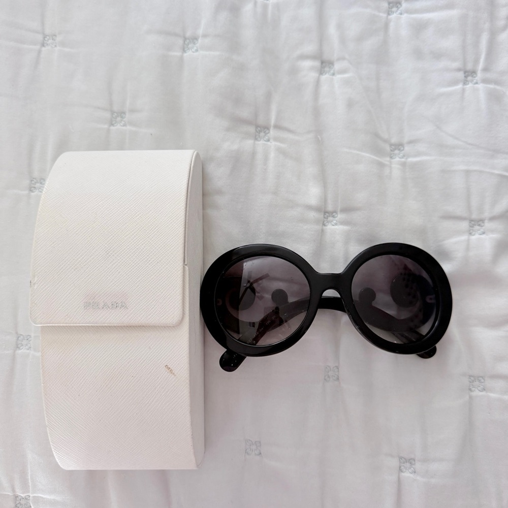 Authentic Prada Women’s Black Round Sunglasses with Dark Lenses